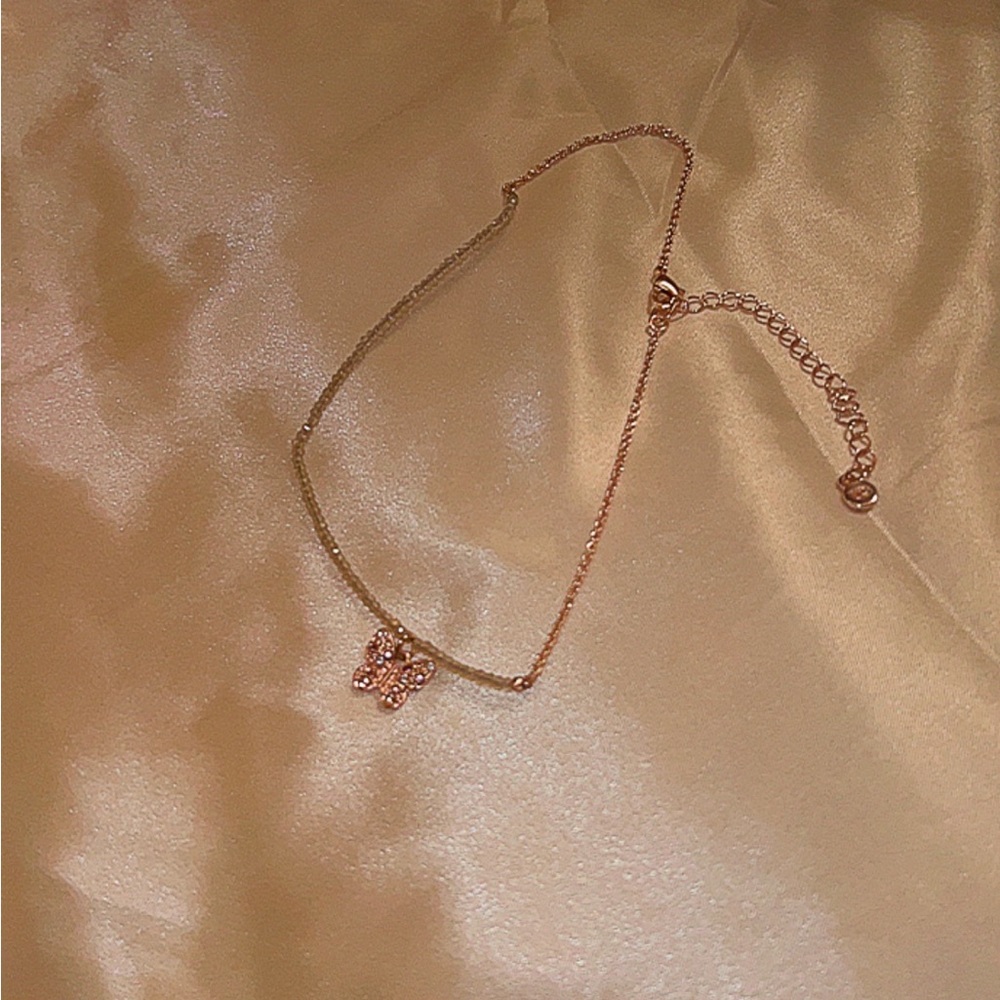 Rose gold charming Charlie’s butterfly chocker